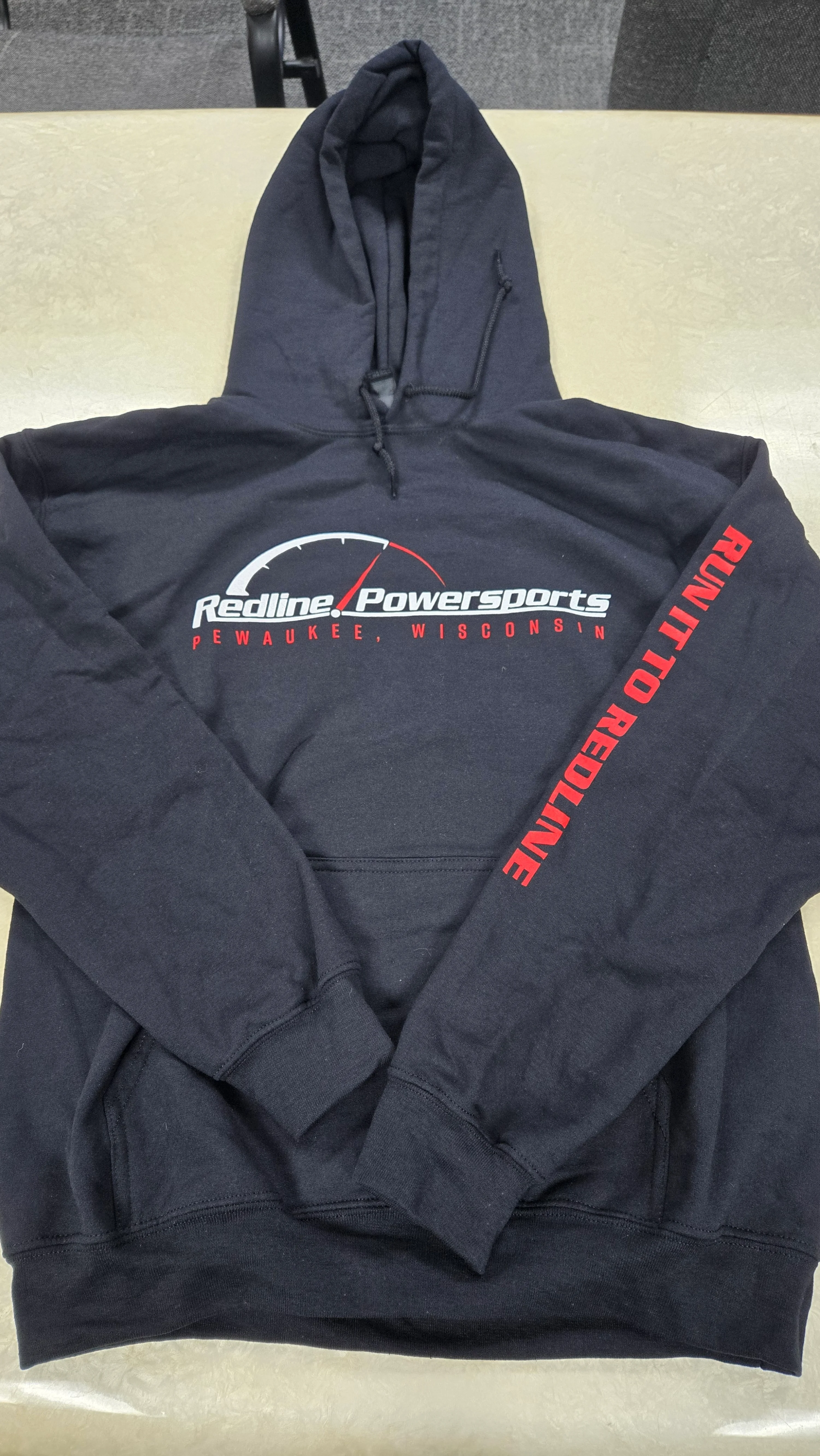 Hoodies, Tees, and a Sleeve Print Built for the Red Zone