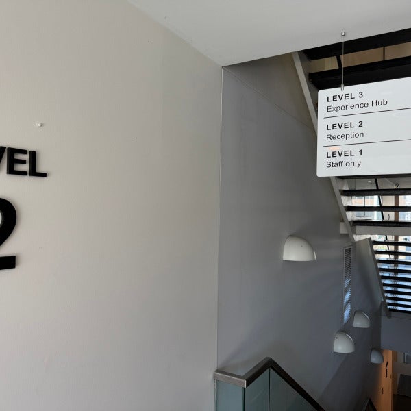 Custom aluminium composite panel (ACP) wayfinding sign with vinyl graphics and acrylic level directory installed at the MTData office for clear navigation and professional branding...