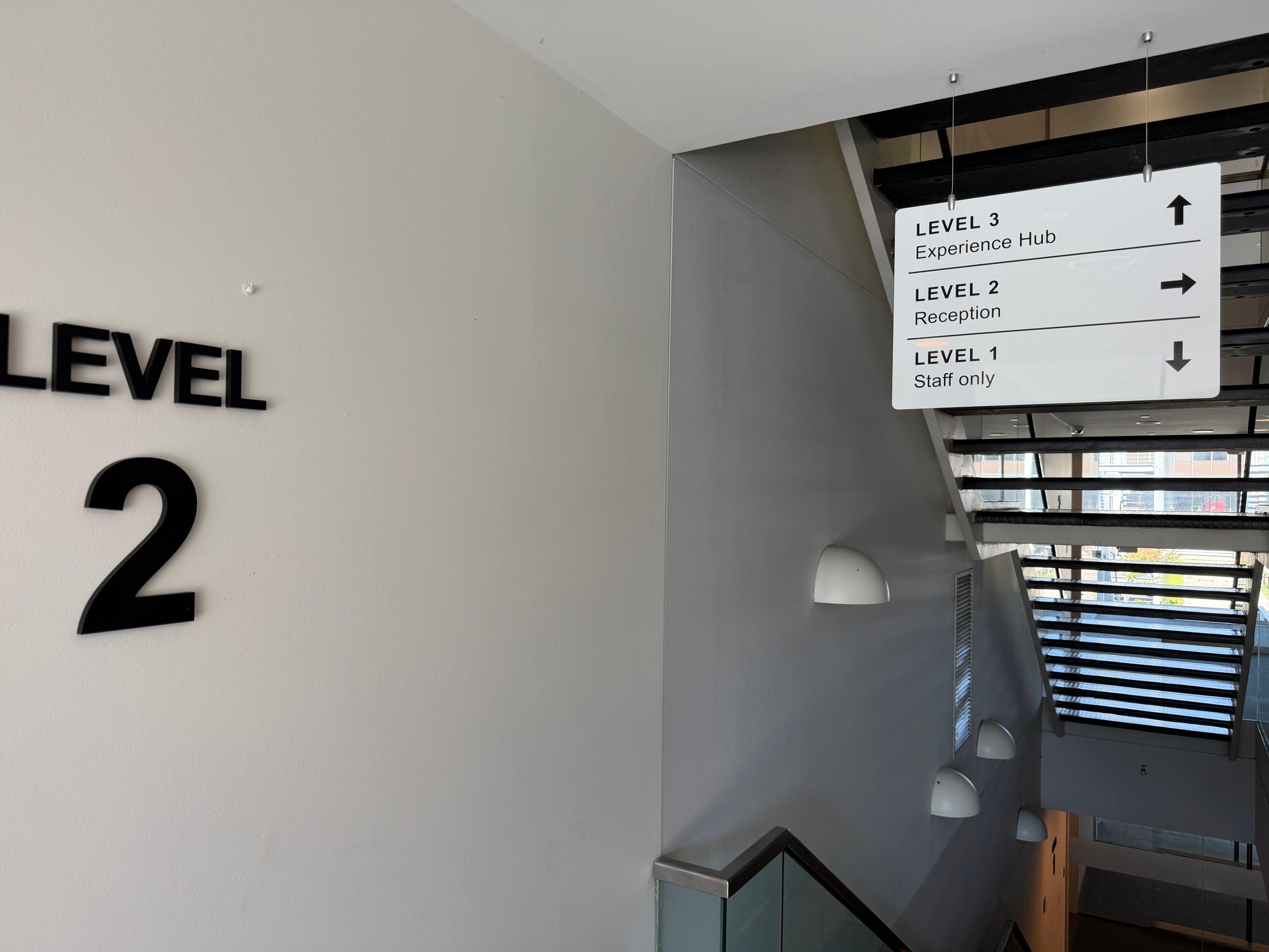 Custom aluminium composite panel (ACP) wayfinding sign with vinyl graphics and acrylic level directory installed at the MTData office for clear navigation and professional branding...