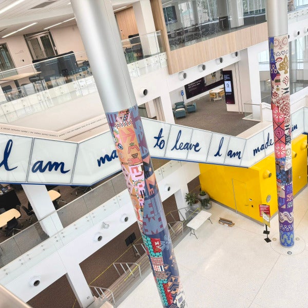 Transforming Hillman Library with Custom Column Wraps & Architectural Vinyl Graphics