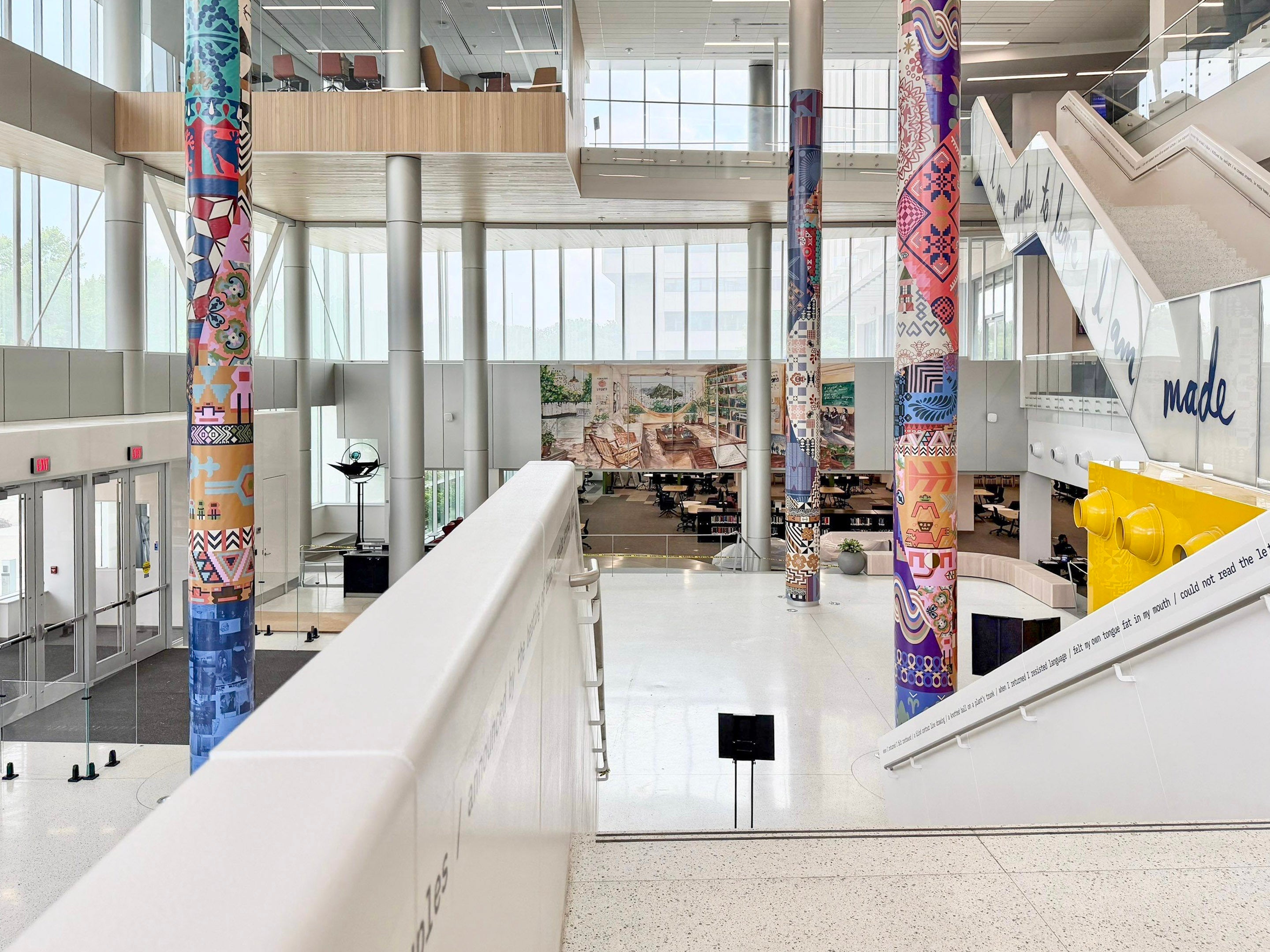 Transforming Hillman Library with Custom Column Wraps & Architectural Vinyl Graphics