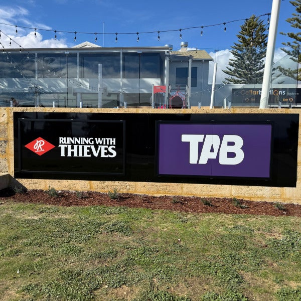 Pouring on the Brand: Signage for Running with Thieves Brewery, Henderson