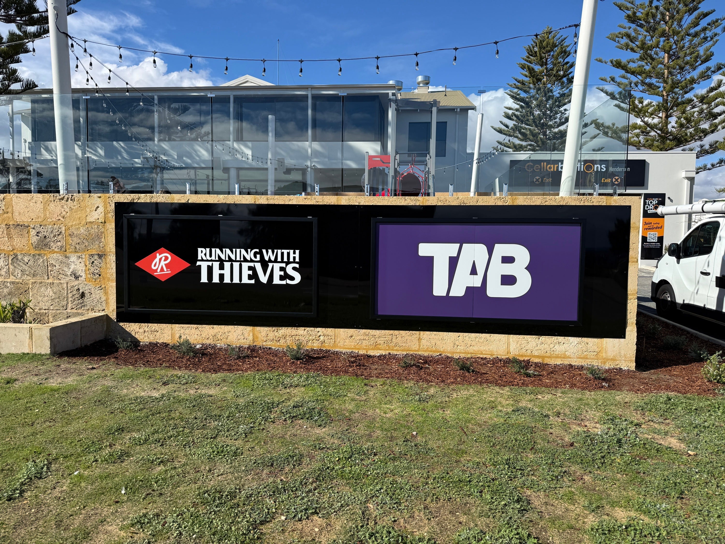 Pouring on the Brand: Signage for Running with Thieves Brewery, Henderson