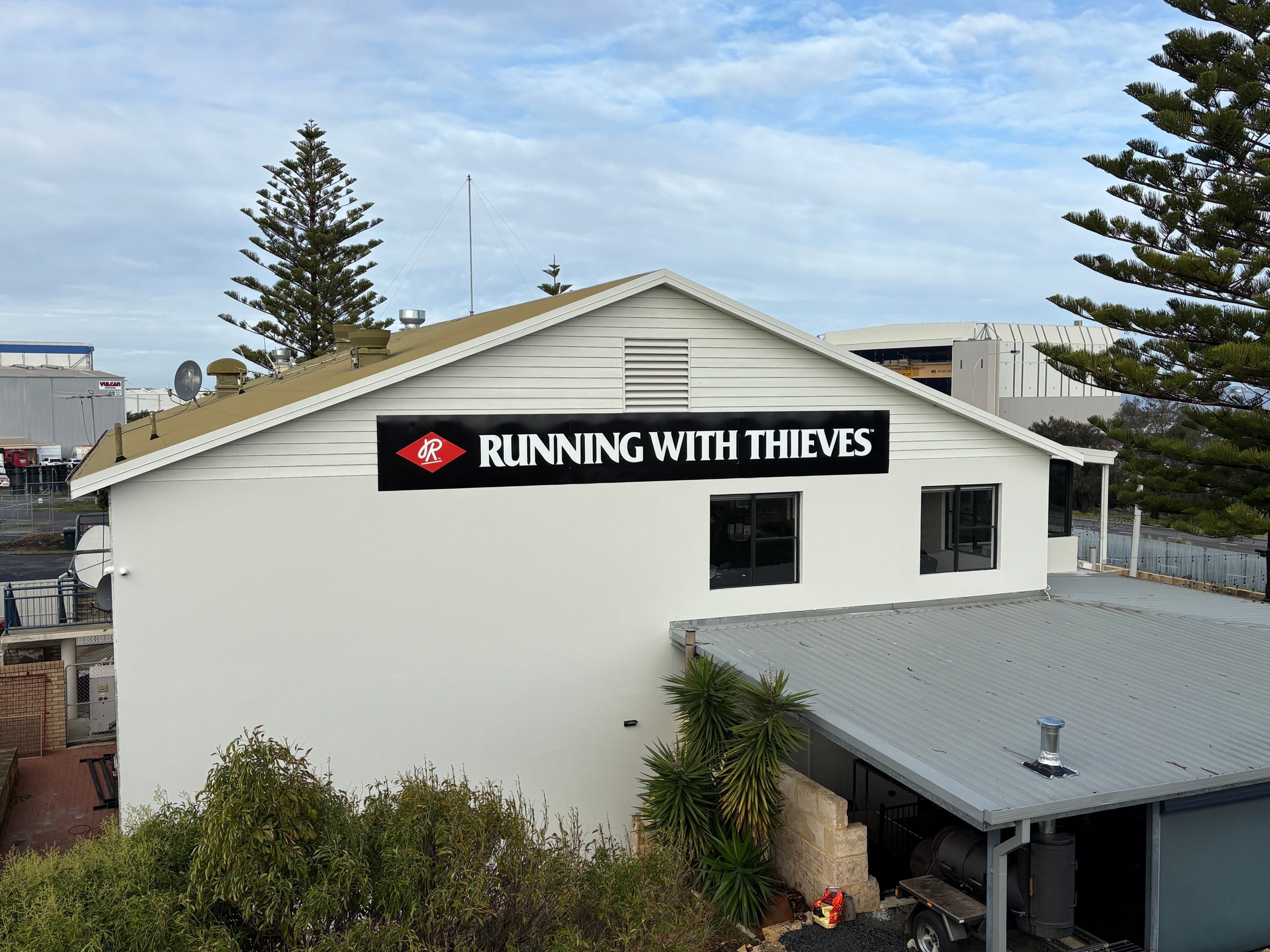 Pouring on the Brand: Signage for Running with Thieves Brewery, Henderson