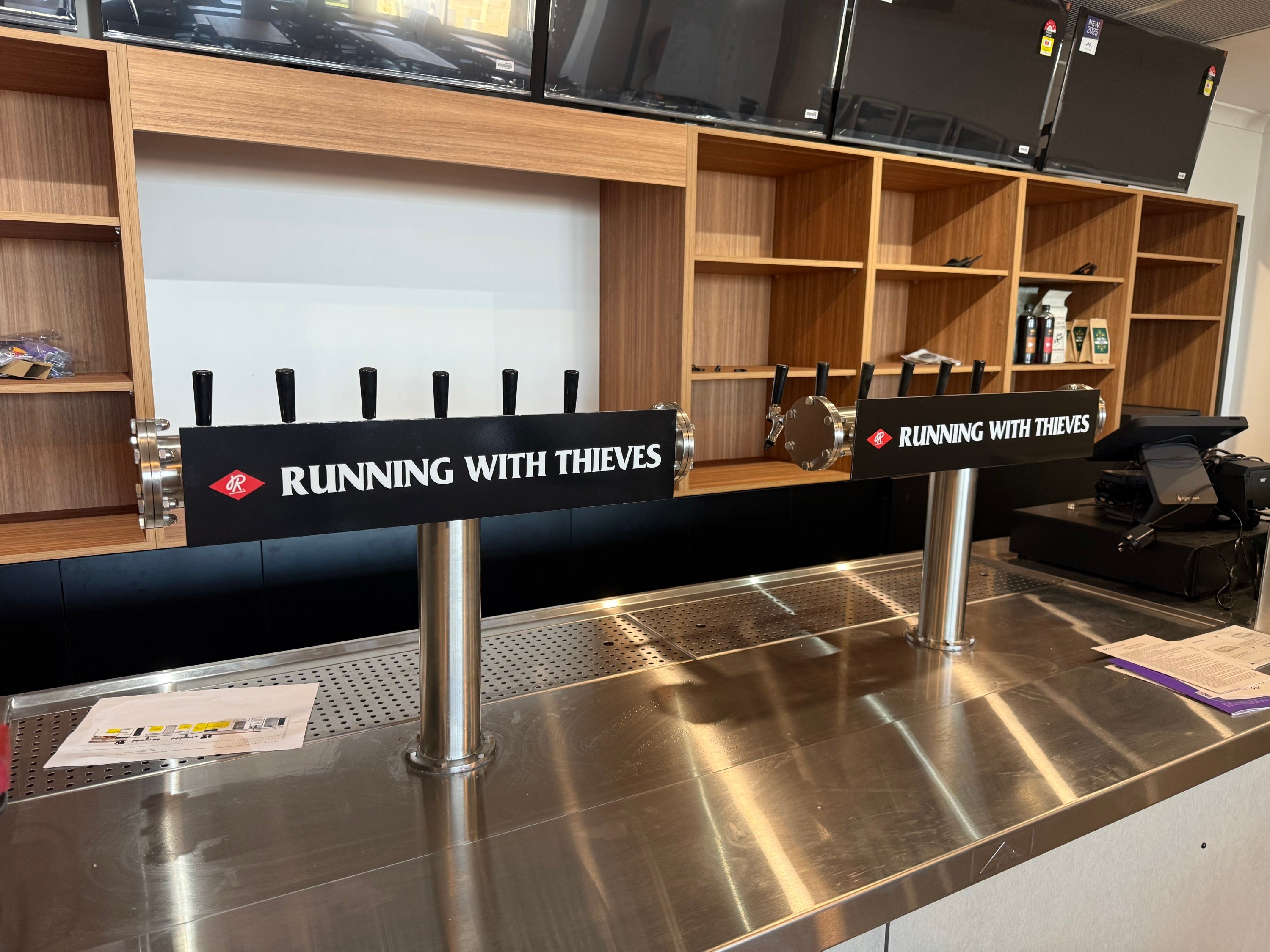 Pouring on the Brand: Signage for Running with Thieves Brewery, Henderson