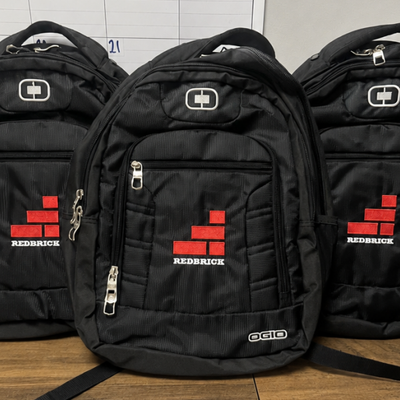 https://cdn.gorilladash.com/images/media/22113229/fully-promoted-usa-redbrick-backpacks-square-6a6cdb0dbc101.png?auto=webp&crop=1%3A1%2Csmart&width=400