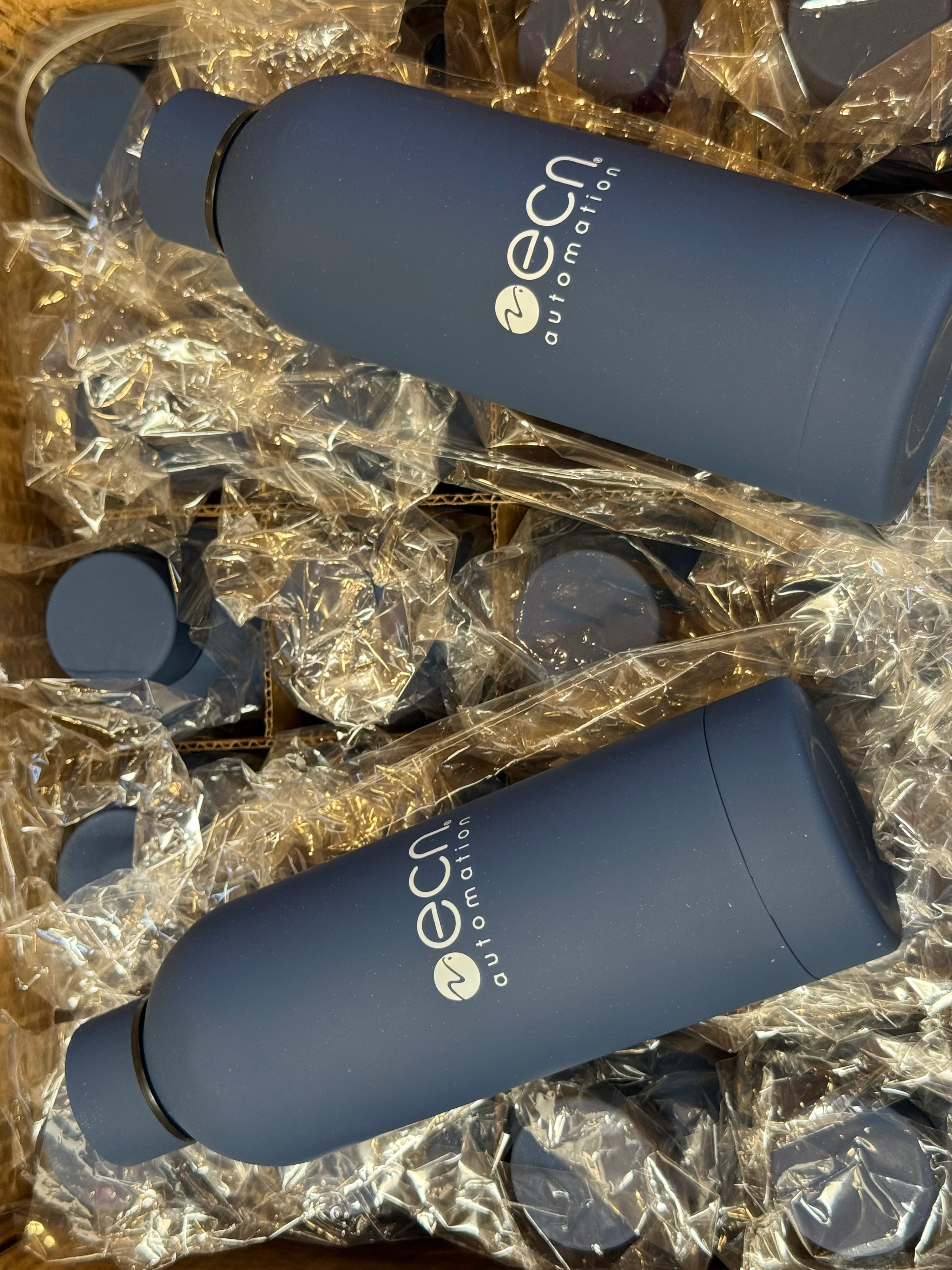 Custom Branded Swag for ECN Automation: Notepads, Bottles & Pens | Phoenix