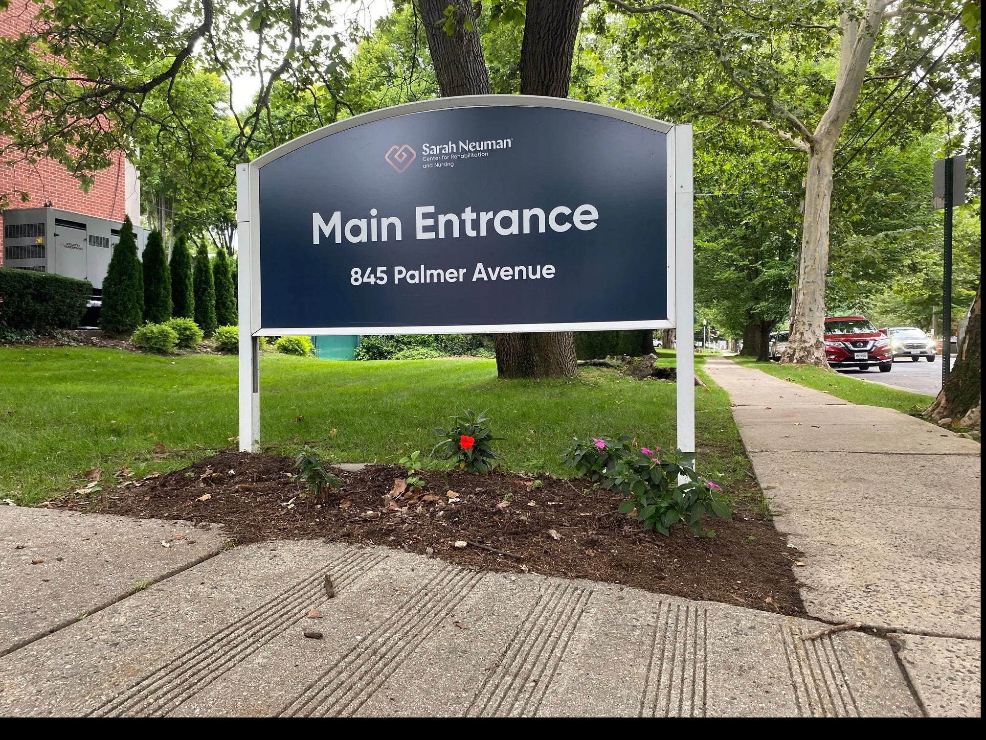 Post & Panel Sign Refacing for Sarah Neuman Center in Mamaroneck, NY