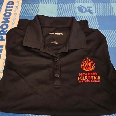 https://cdn.gorilladash.com/images/media/22155818/fully-promoted-usa-holiday-folk-fair-international-embroidered-black-polo-square-6a7de0238dad2.jpg?auto=webp&crop=1%3A1%2Csmart&width=400