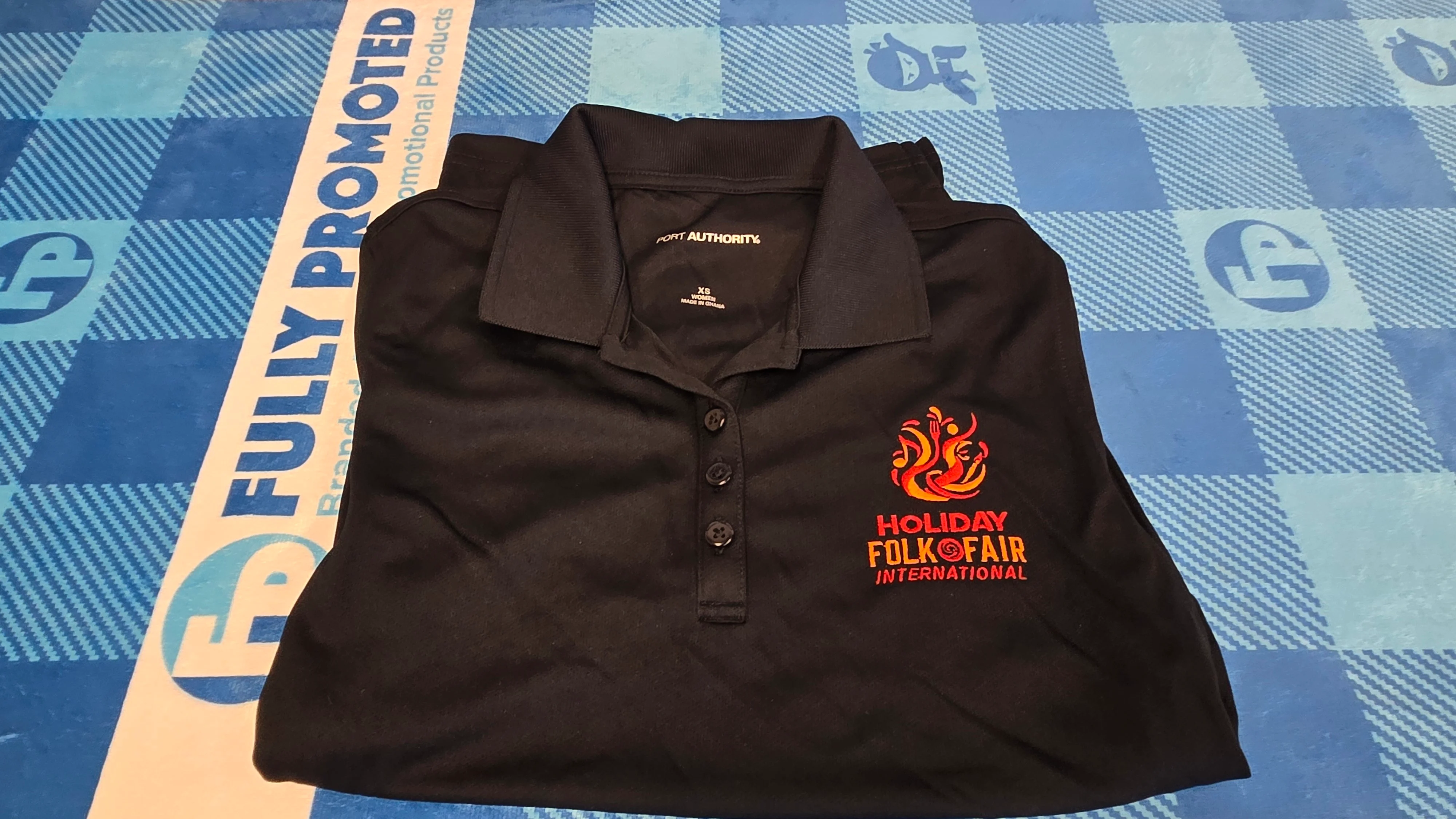 Embroidered Port Authority Polos for Holiday Folk Fair International