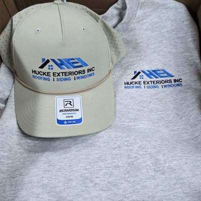 https://cdn.gorilladash.com/images/media/22156037/fully-promoted-usa-hucke-exteriors-cap-and-crewneck-square-6a7de32e46543.jpg?auto=webp&crop=1%3A1%2Csmart&width=400