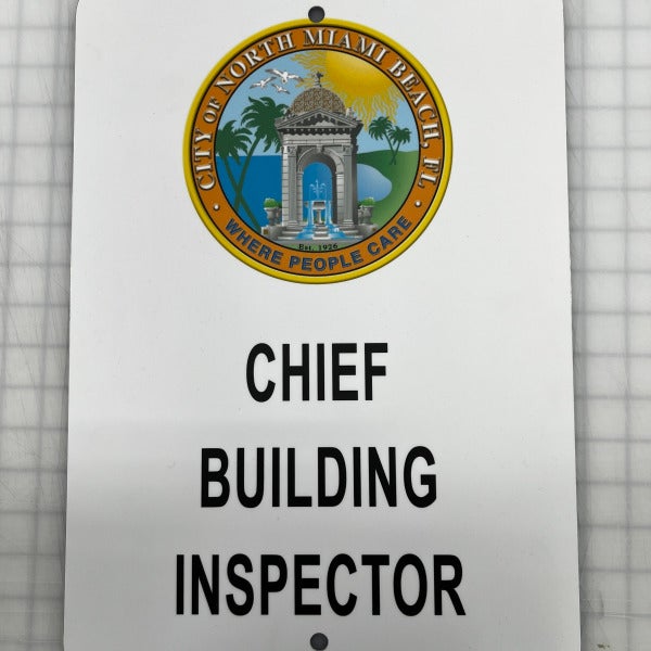 chief building inspector parking sign