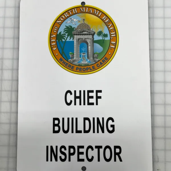 chief building inspector parking sign