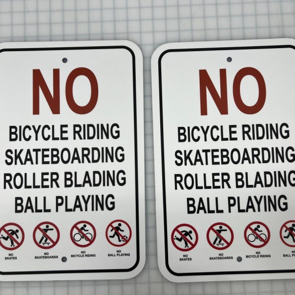 NO biking, skating, roller blading, ball playign sign