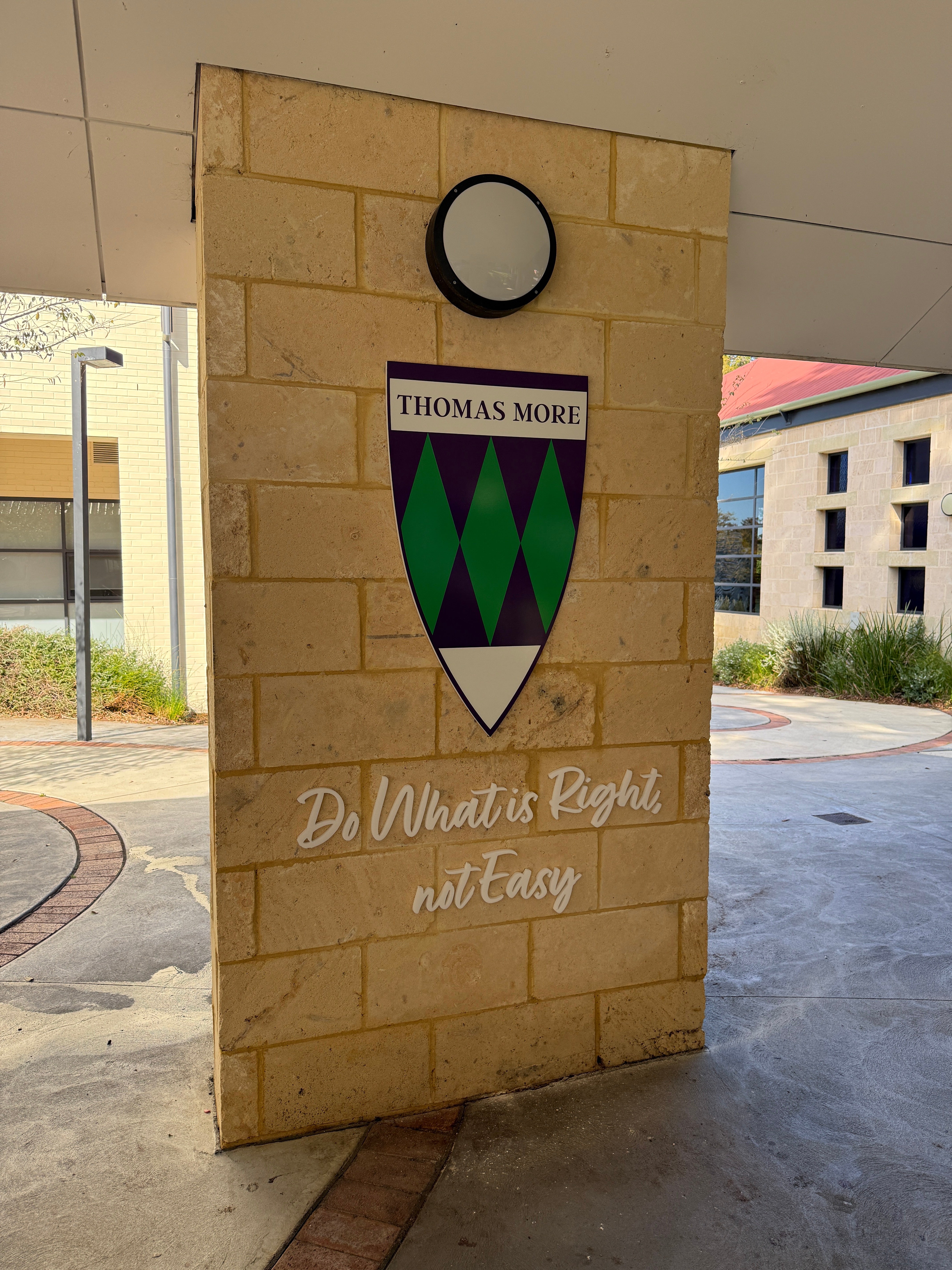 Bringing School Spirit to Life: Guild Shield Signage for Newman College