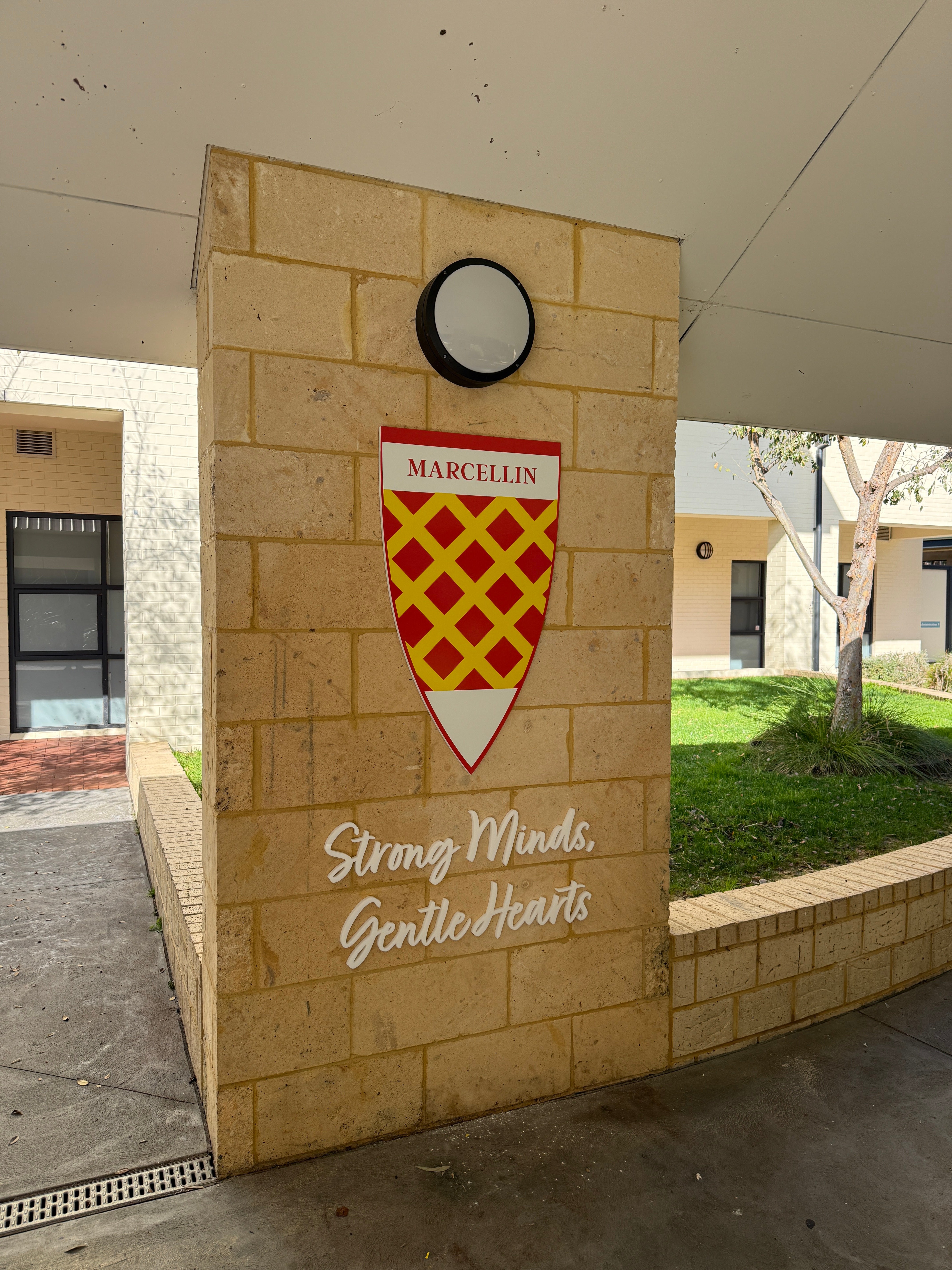 Bringing School Spirit to Life: Guild Shield Signage for Newman College