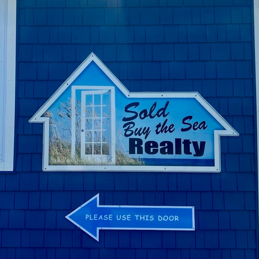Sold Buy the Sea Realty - ACM Sign