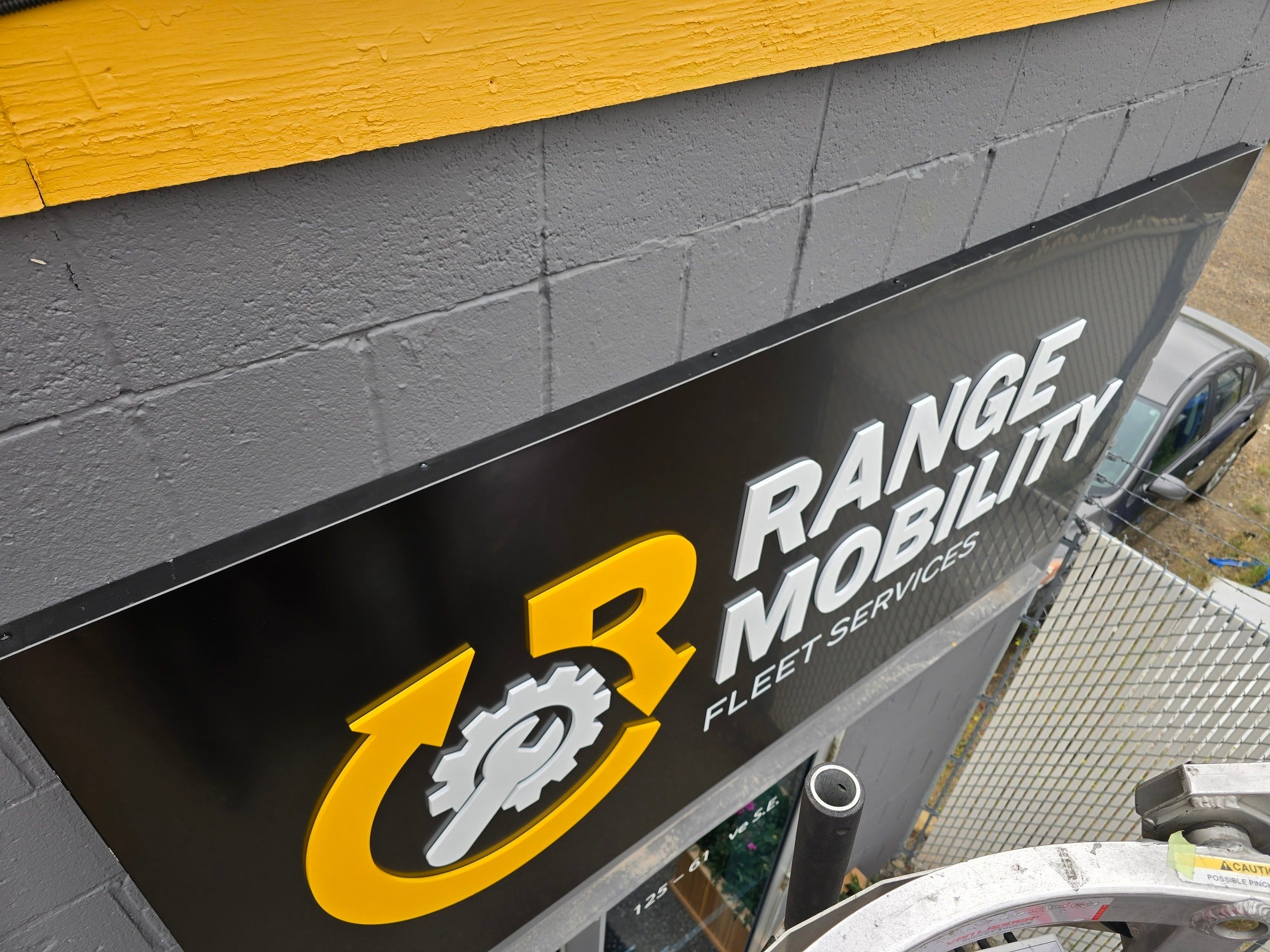 Range Mobility Storefront Sign