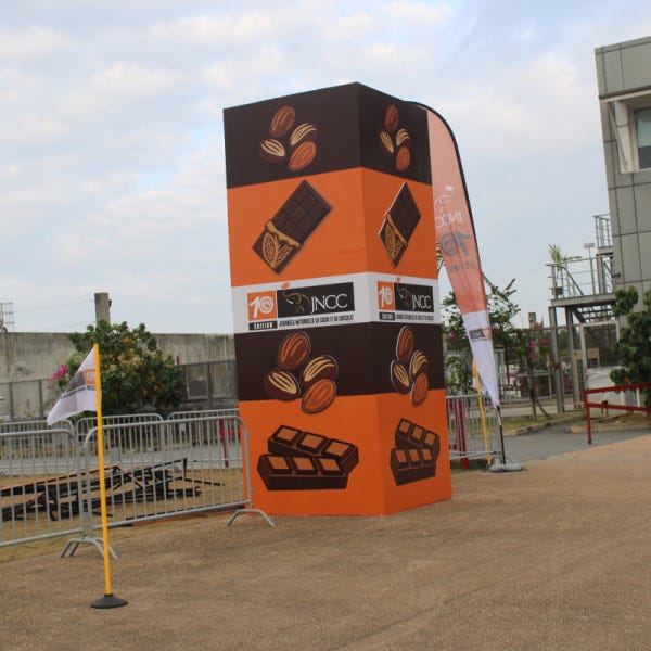 Totem publicitaire 4 côtés- Signalétique – habillage personnalisé vynil Imprimé -JNCC 2026 - Signarama Côte d'Ivoire -Cocody Abidjan