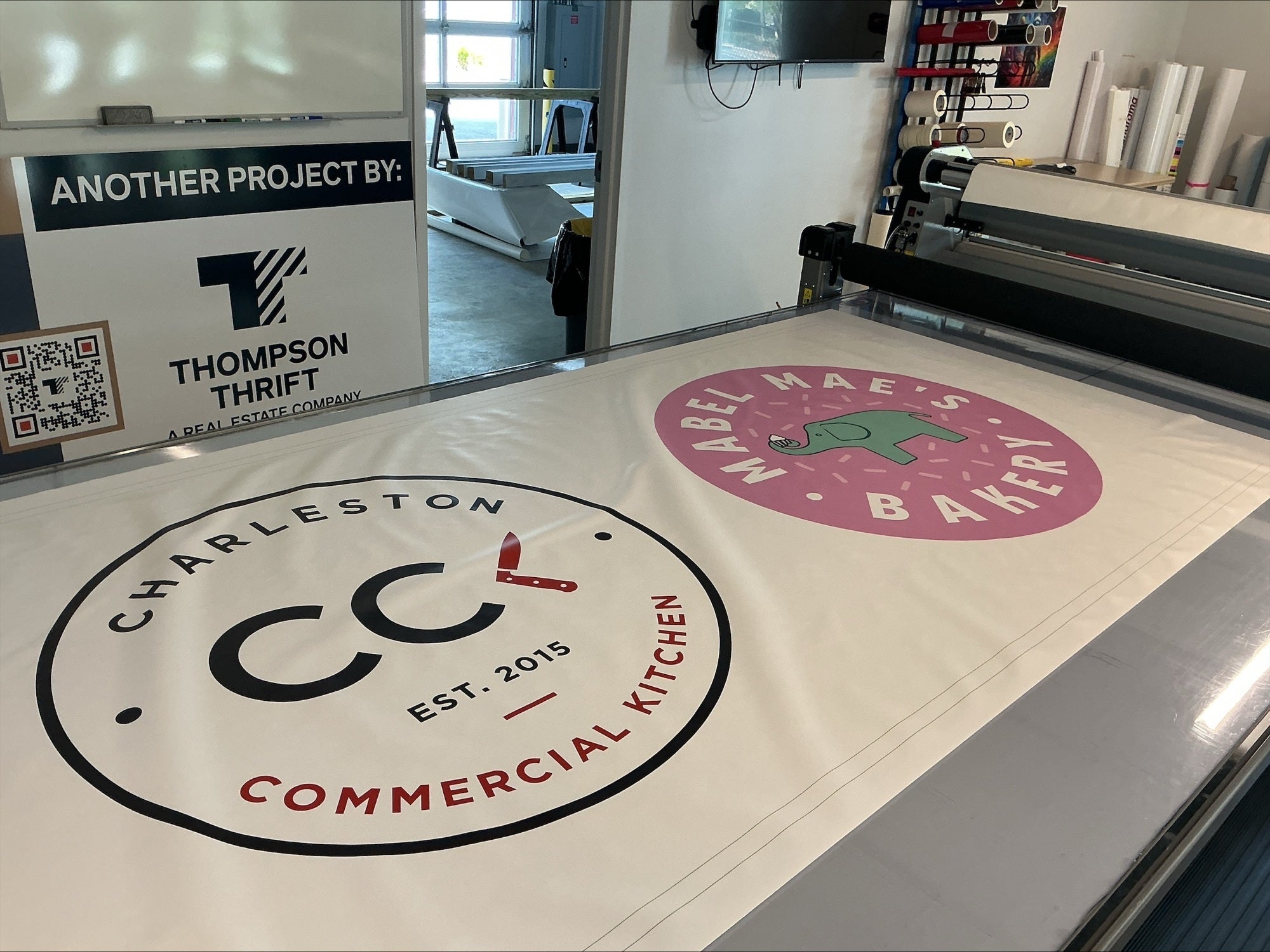 Custom Sign-4 x 8 Banner custom to accommodate two adjacent businesses