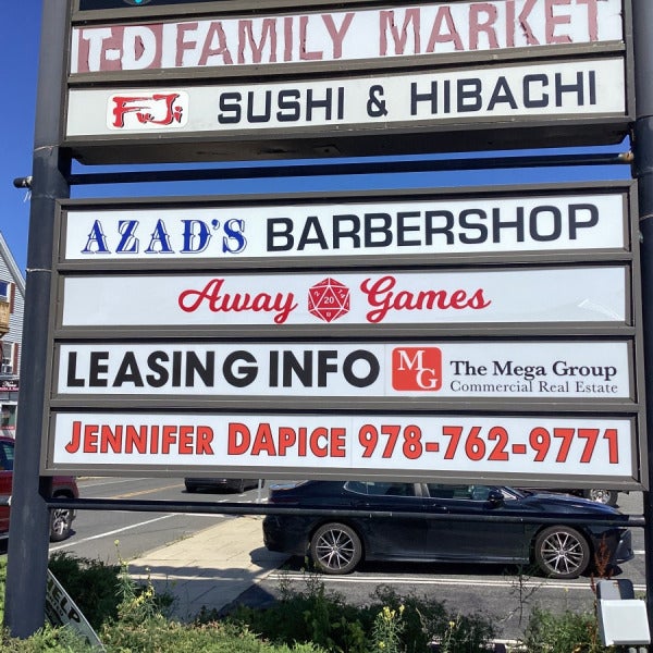 Custom Pylon Sign Graphics Improve Tenant Visibility at Busy Retail Center