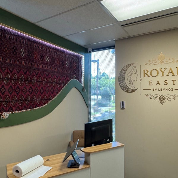 Custom Gold Acrylic Dimensional Letters & Vinyl Graphics for Royal East LLC in Oakton, VA