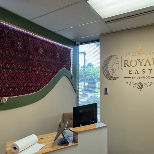 Custom Gold Acrylic Dimensional Letters & Vinyl Graphics for Royal East LLC in Oakton, VA