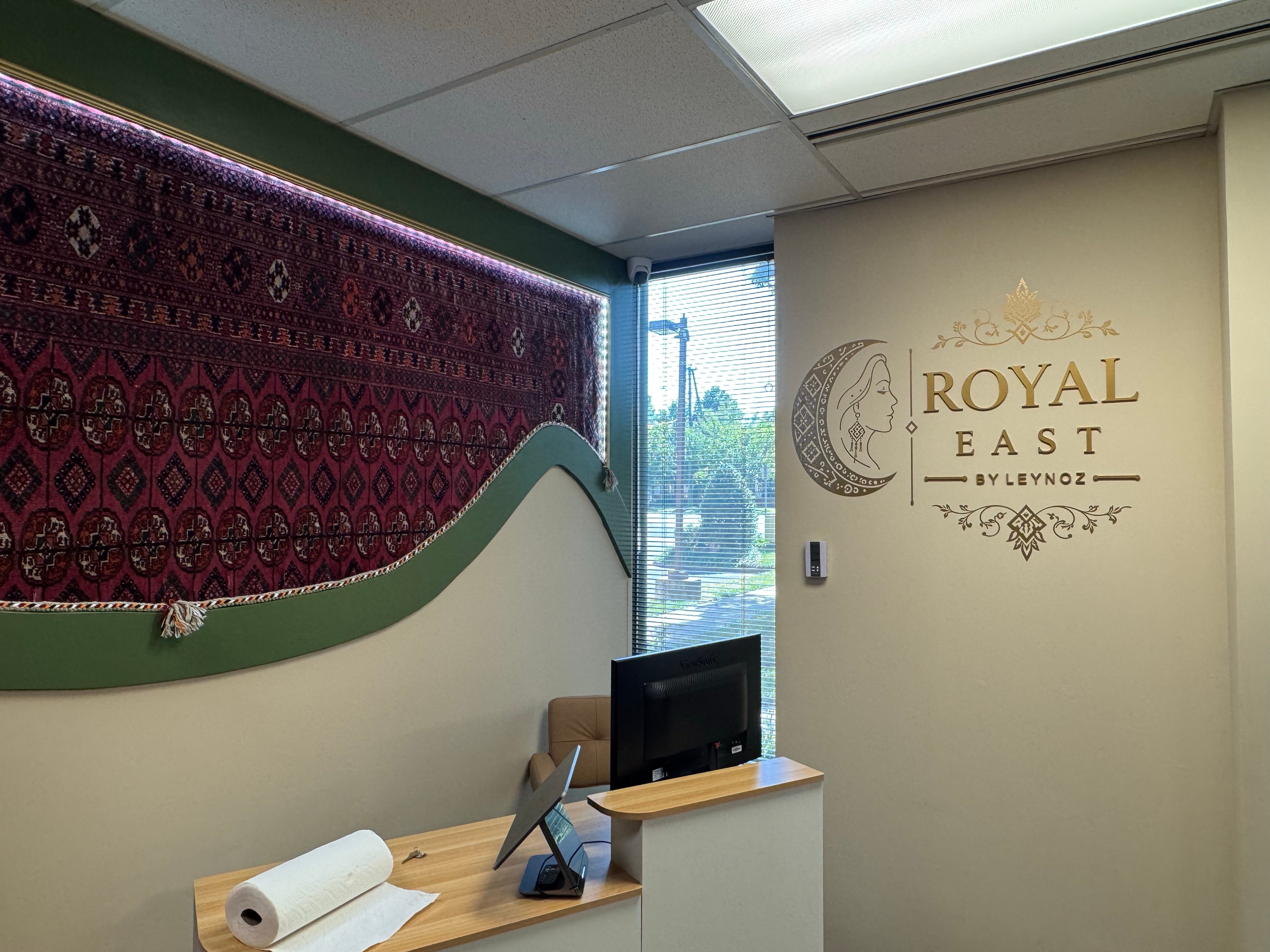 Custom Gold Acrylic Dimensional Letters & Vinyl Graphics for Royal East LLC in Oakton, VA