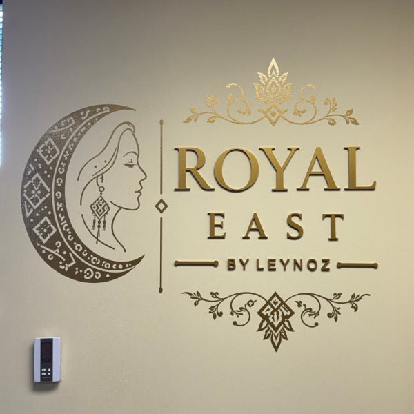 Custom Gold Acrylic Dimensional Letters & Vinyl Graphics for Royal East LLC in Oakton, VA