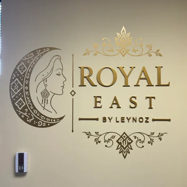 Custom Gold Acrylic Dimensional Letters & Vinyl Graphics for Royal East LLC in Oakton, VA