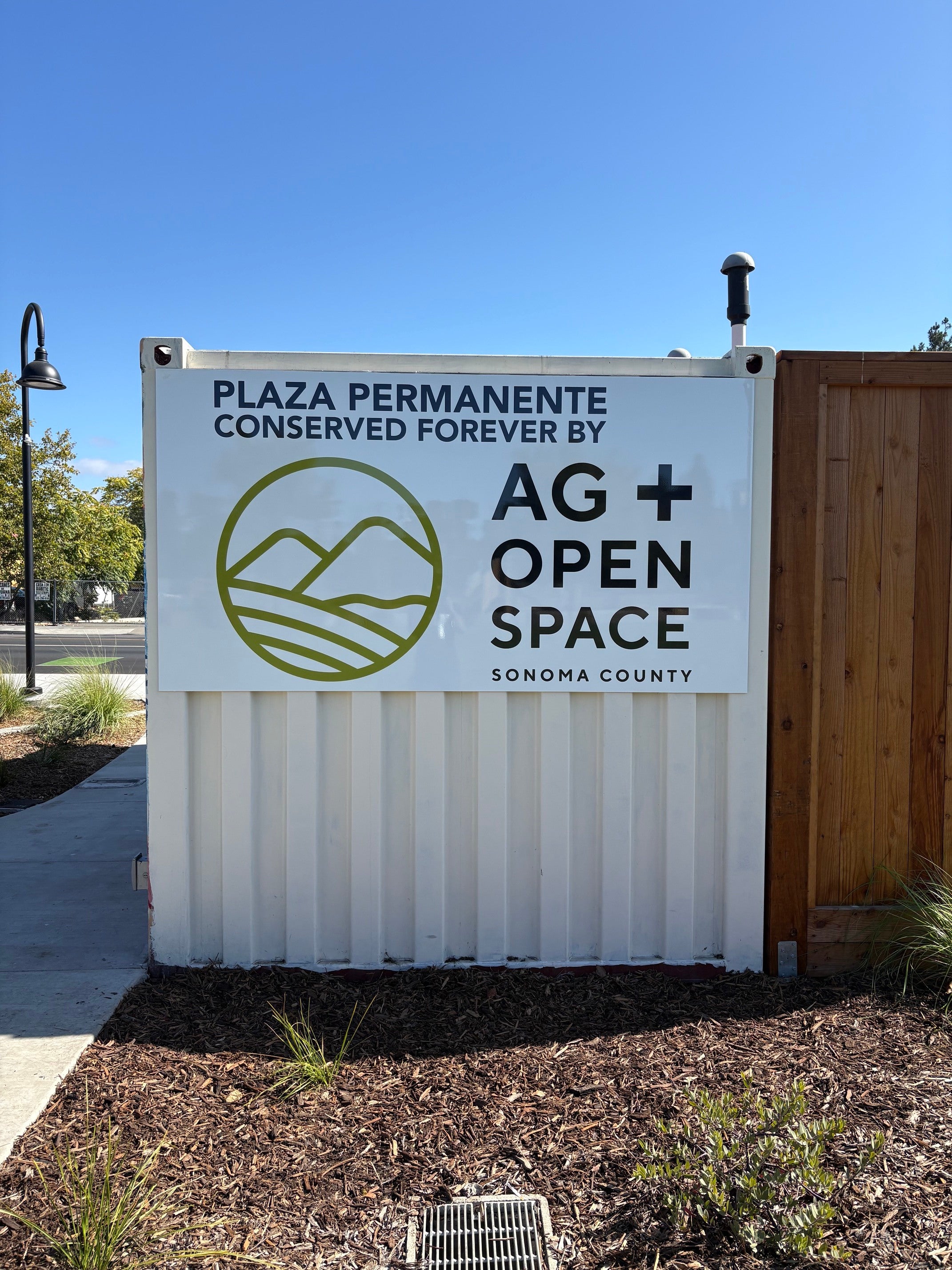 Agricultural and open space conservation sign at Plaza Permanente in Santa Rosa
