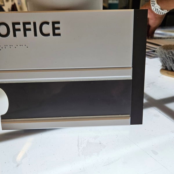 Custom braille signs with slide in window