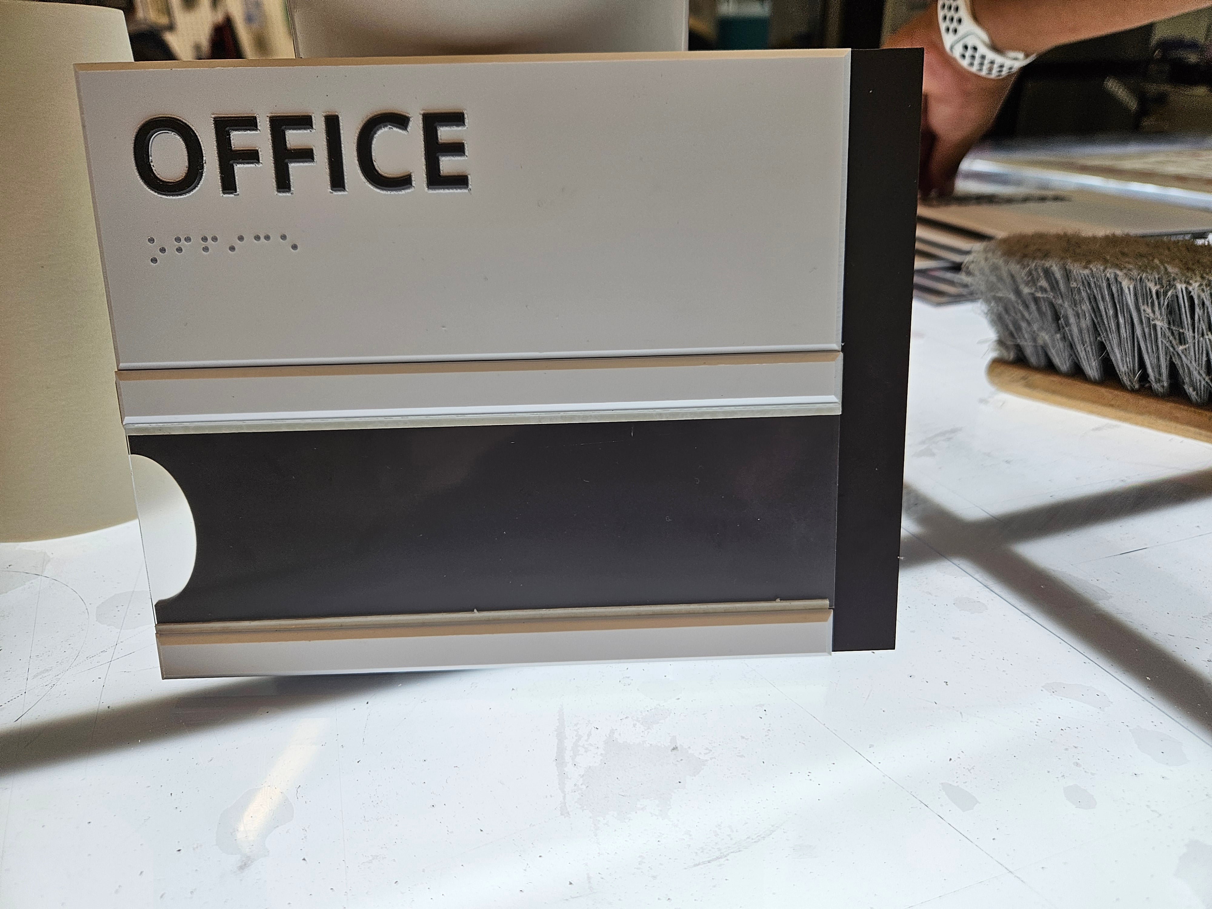 Custom braille signs with slide in window