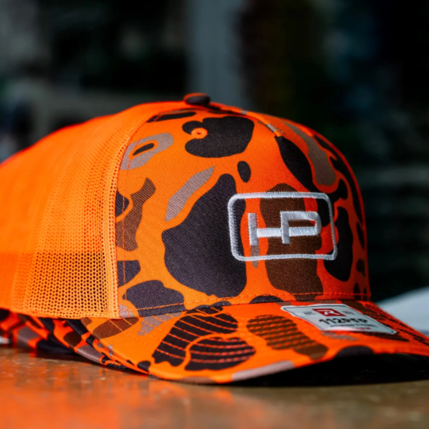 Custom Orange Camo Trucker Hats with Embroidered Logo
