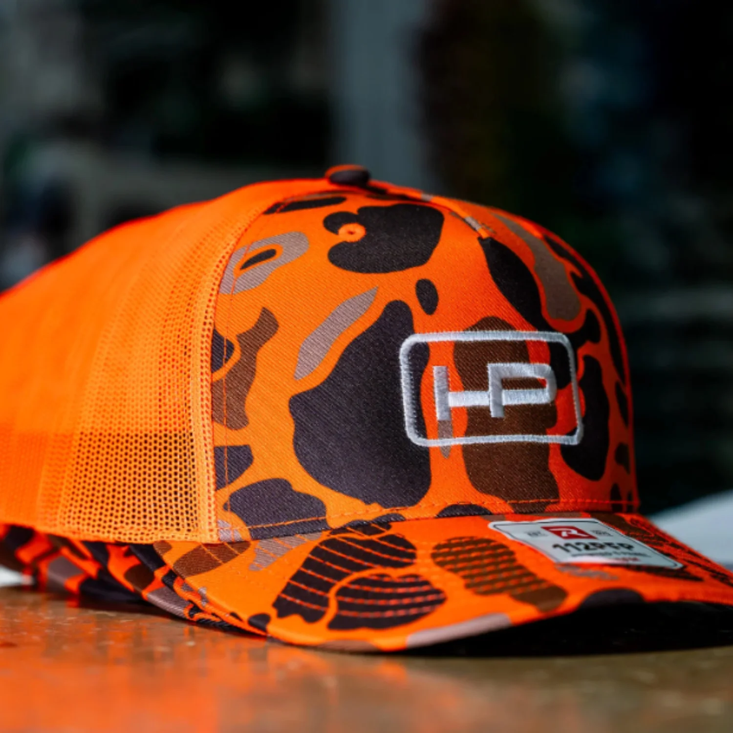 Custom Orange Camo Trucker Hats with Embroidered Logo