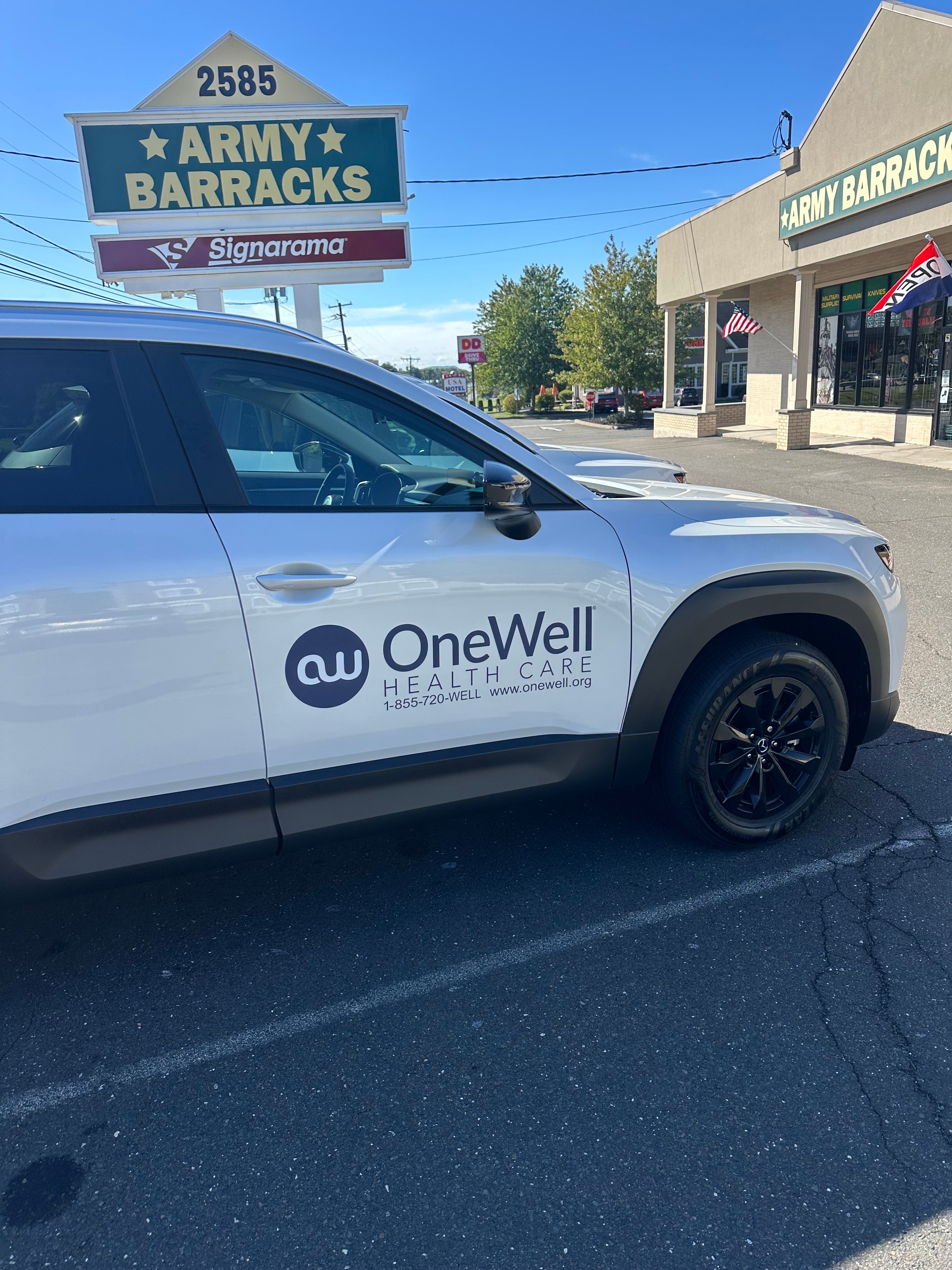 Vehicle Graphics for OneWell Health Care by Signarama Newington