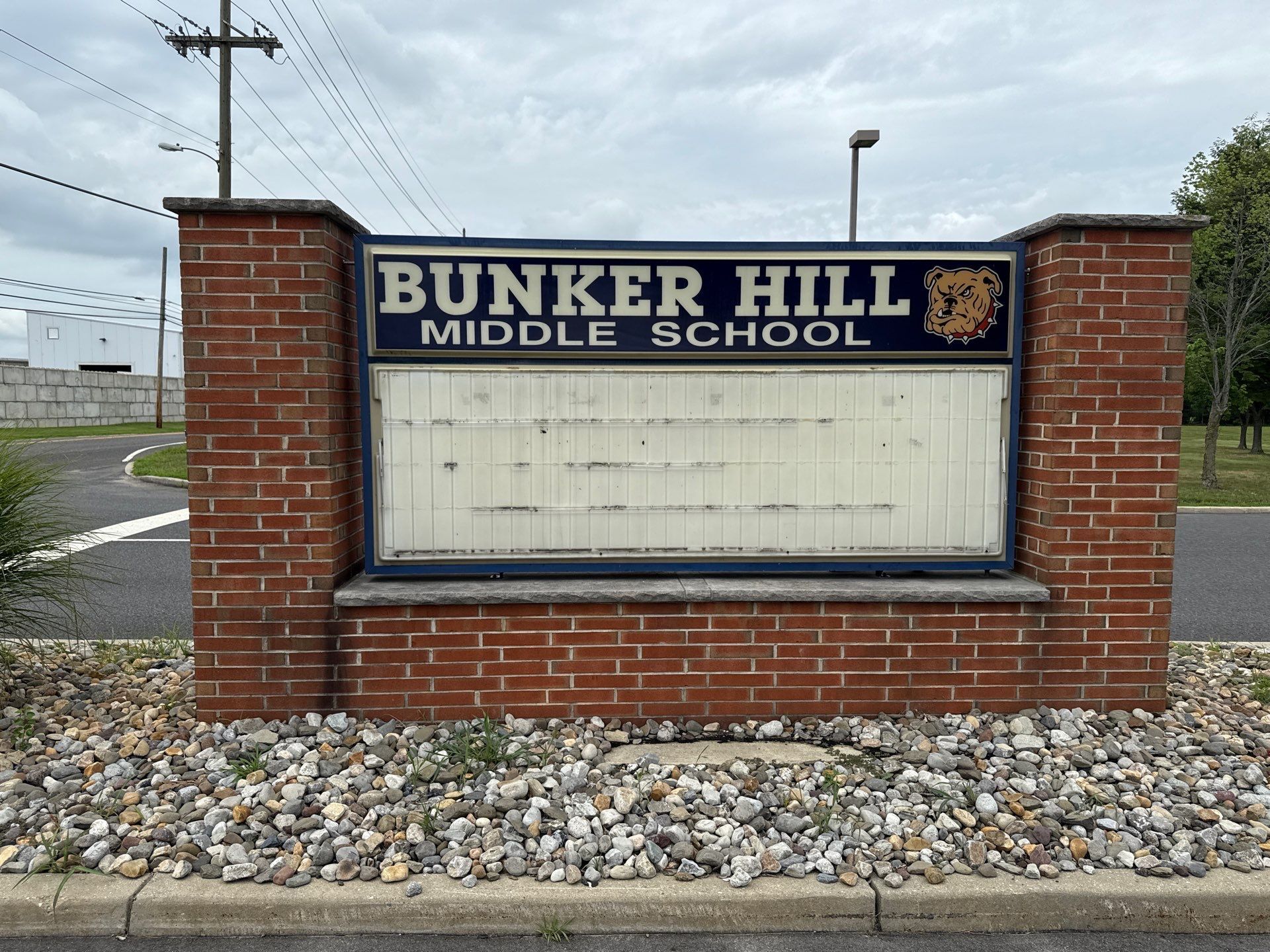 Carved school sign in Washington Township