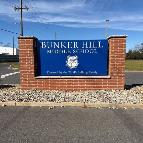 Carved school sign in Washington Township