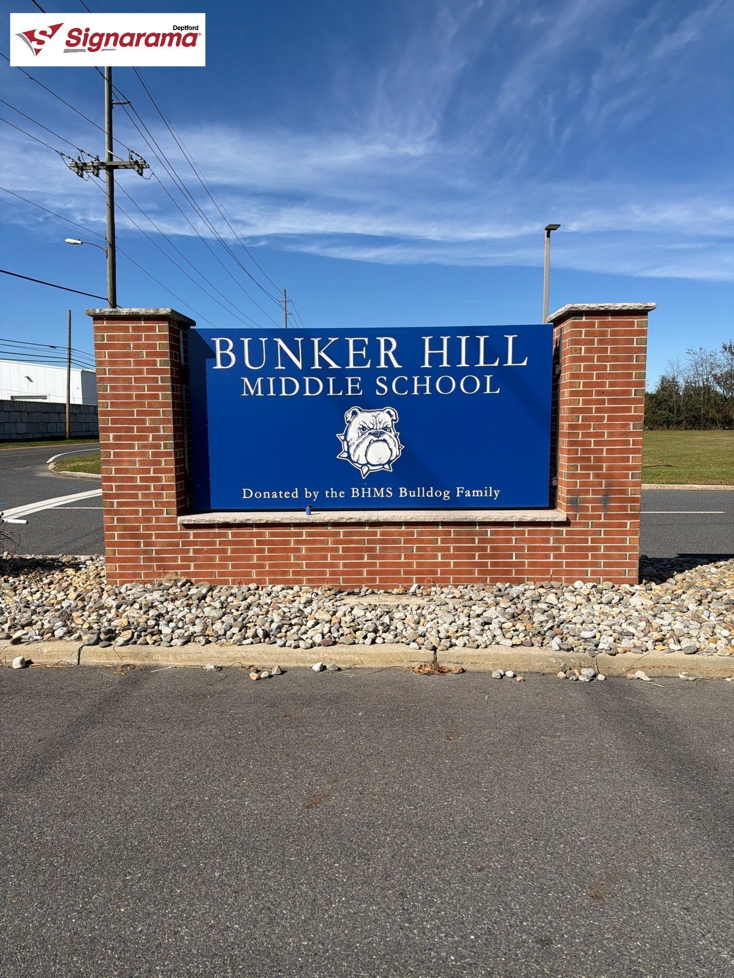 Carved school sign in Washington Township