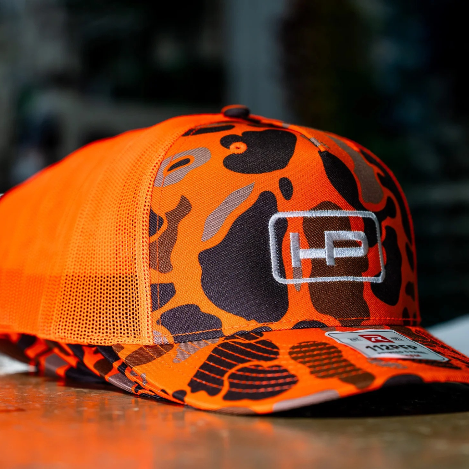 Custom Orange Camo Trucker Hats with Embroidered Logo