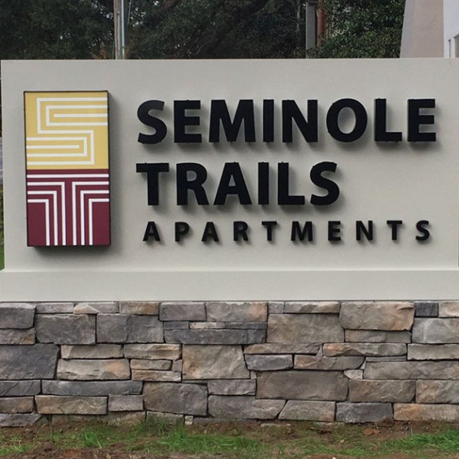 White Monument Sign with 3D Logo and lettering
