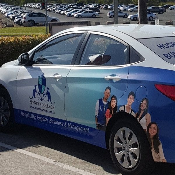 Spencer College Vehicle wrap