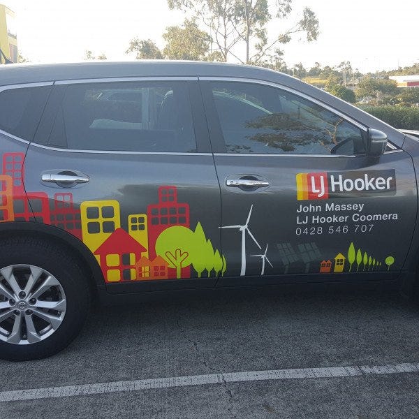 LJ Hooker vehicle graphics half wrap