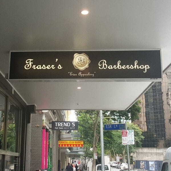 Under awning illuminated sign