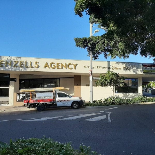 Henzells Agency Signage Installation