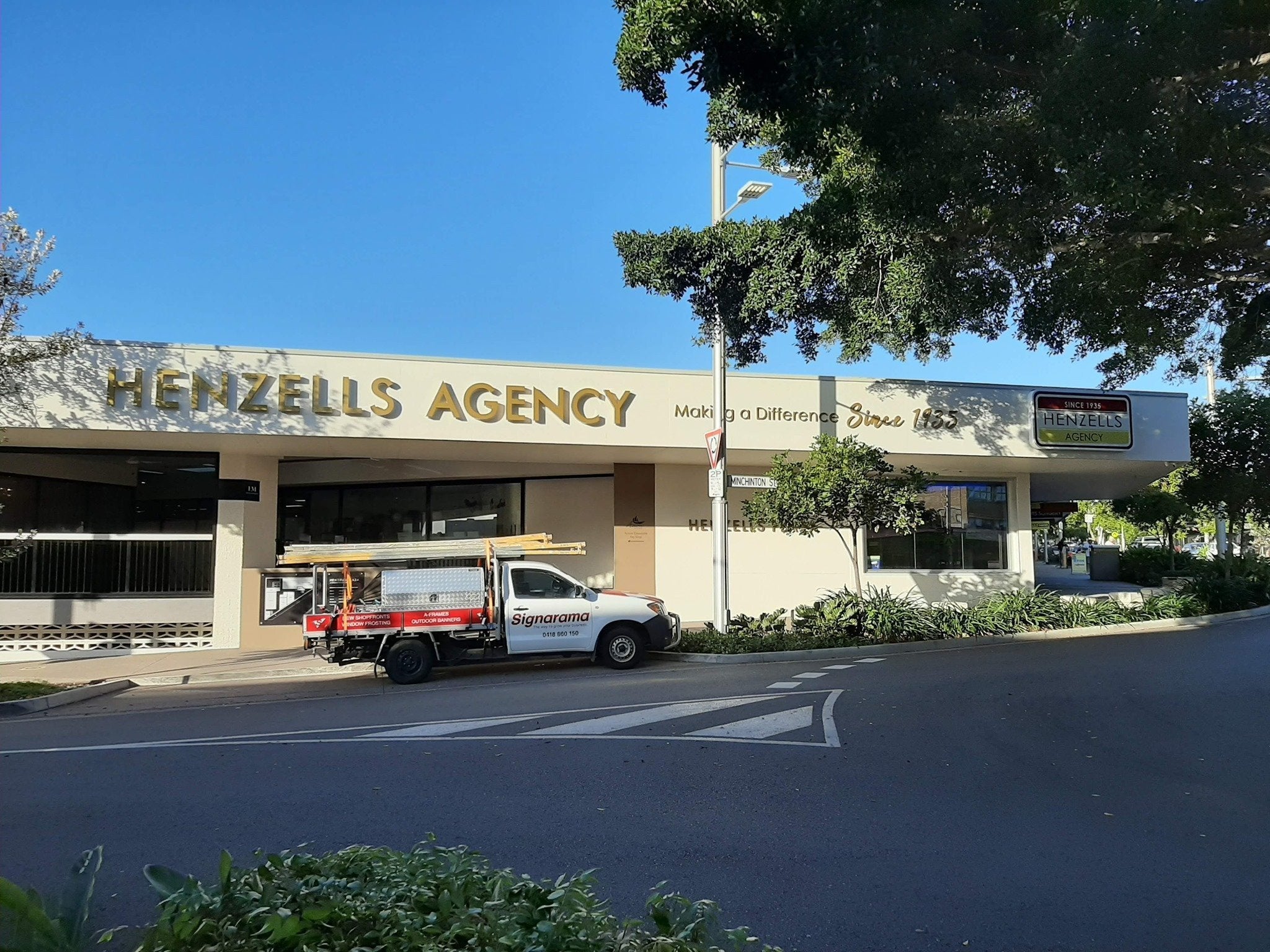 Henzells Agency Signage Installation