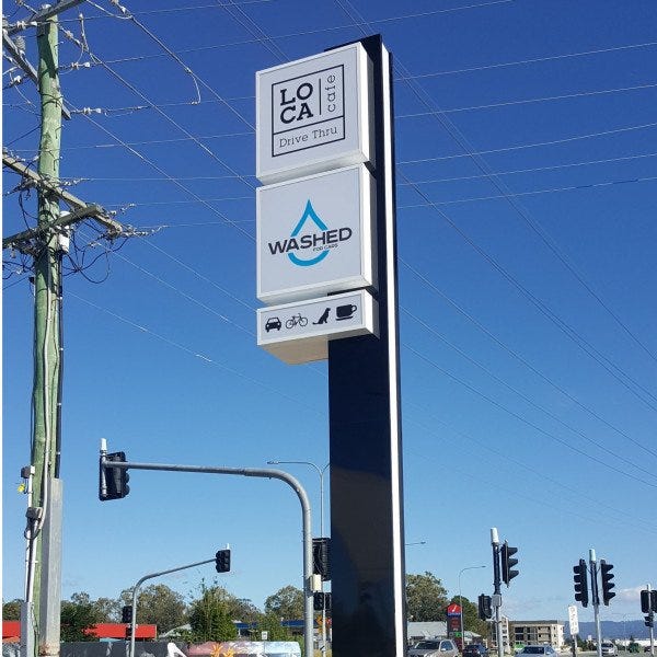 Signarama Helensvale Illuminated pylon sign Loca Washed Runaway Bay
