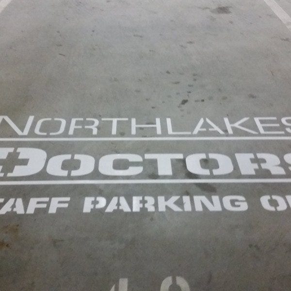 Staff Car parking painted floor graphic