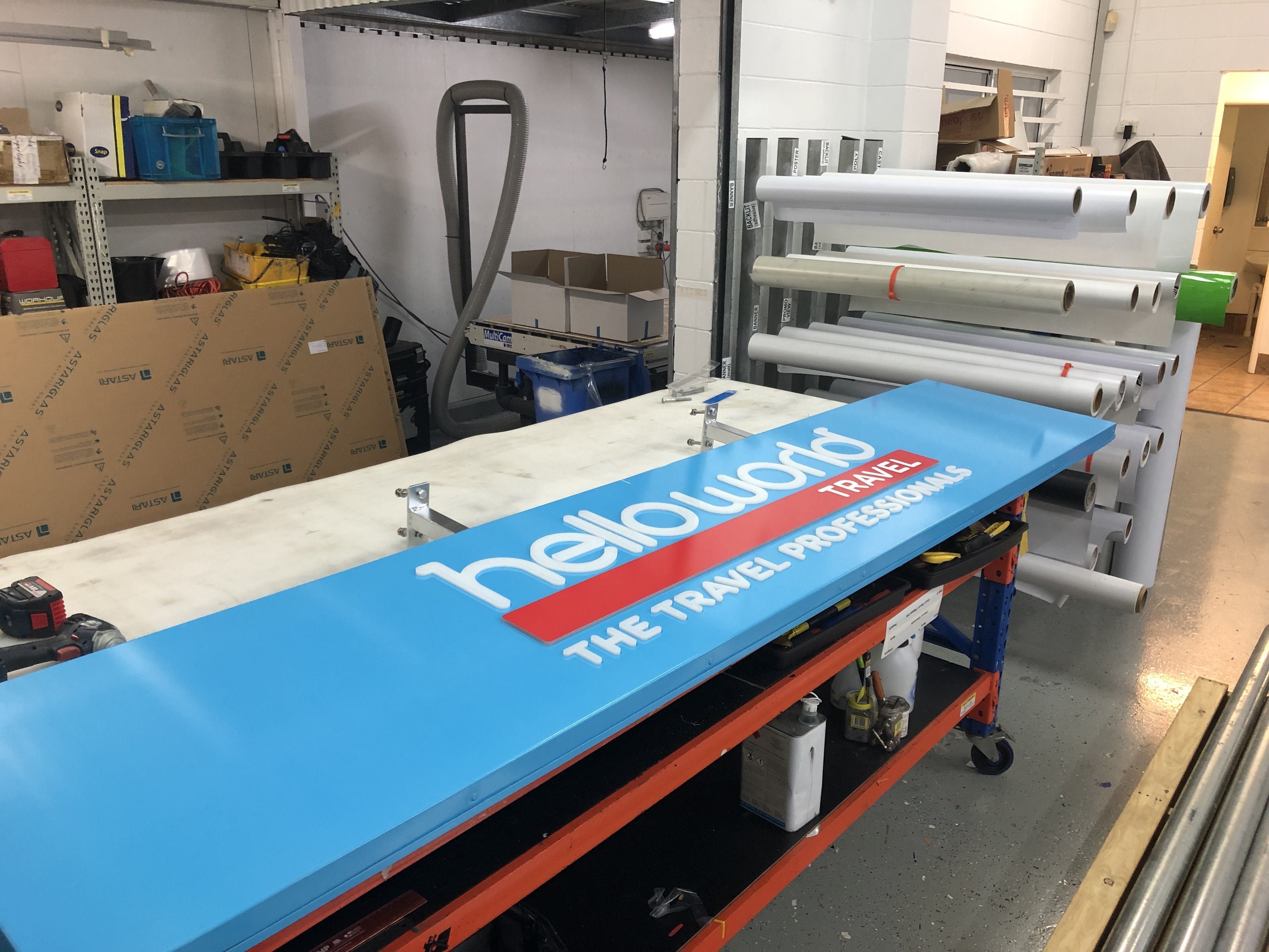 helloworld fascia with illuminated lettering and wall signage complete