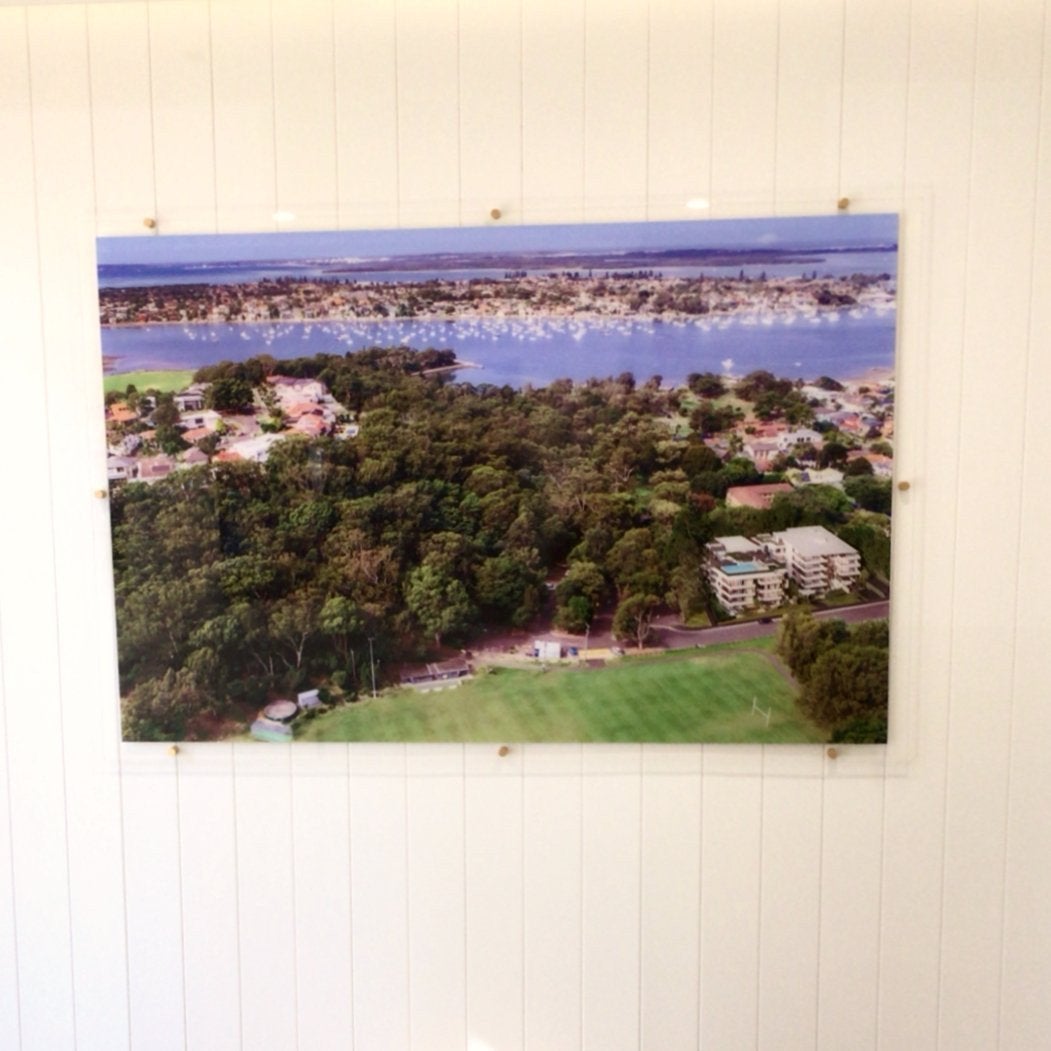 Lateral Estate Acrylic with digital print to the back finished with gold standoffs - Signarama Sydney CBD South